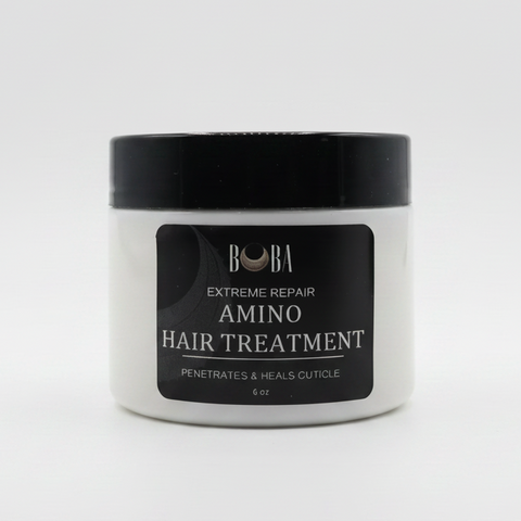 Jar of hair treatment on a white surface
